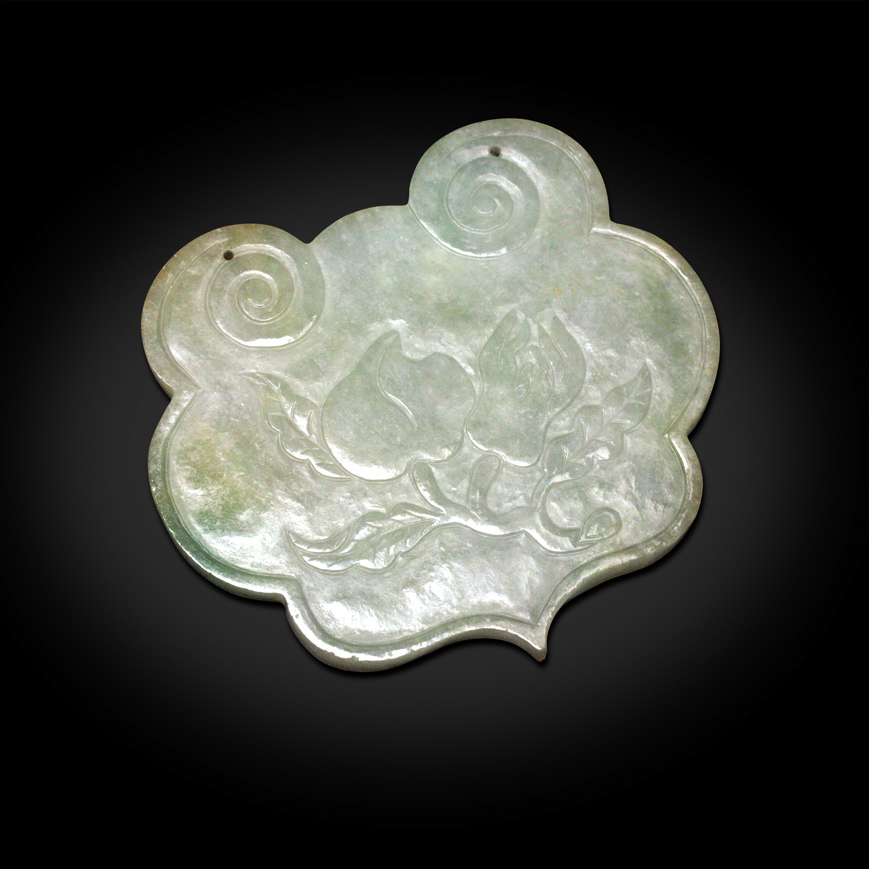A JADEITE PLAQUE IN A RUYI SHAPE, LATE QING 19TH