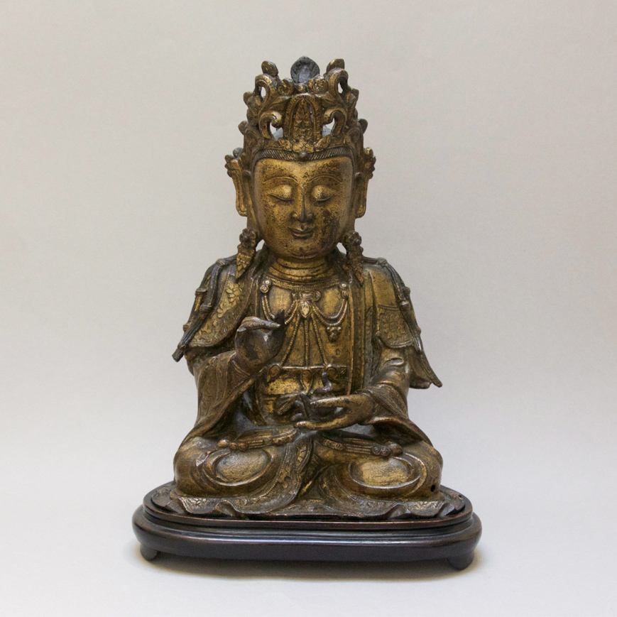 A GOLD LACQUERED BRONZE GUANYIN FIGURE