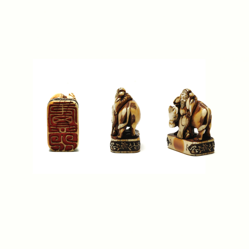 AN IVORY SEAL NETSUKE FIGURE OF SOUHO, EDO LATE 18TH