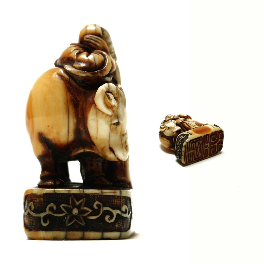 AN IVORY SEAL NETSUKE FIGURE OF SOUHO, EDO LATE 18TH