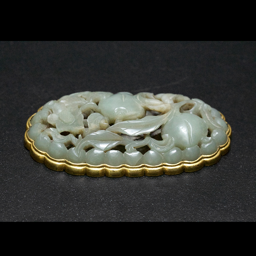 A RARE JADE PLAQUE AND GILT-BRONZE