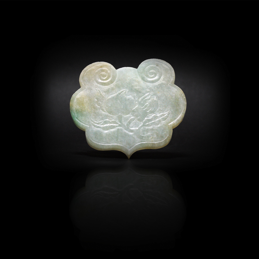 A JADEITE PLAQUE IN A RUYI SHAPE, LATE QING 19TH