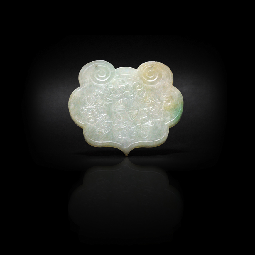 A JADEITE PLAQUE IN A RUYI SHAPE, LATE QING 19TH