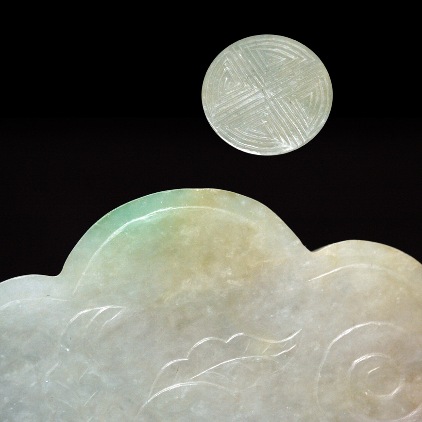 A JADEITE PLAQUE IN A RUYI SHAPE, LATE QING 19TH