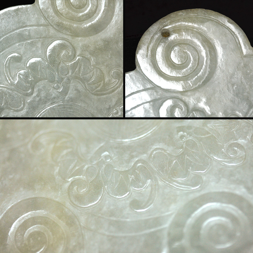 A JADEITE PLAQUE IN A RUYI SHAPE, LATE QING 19TH