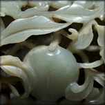 A RARE JADE PLAQUE AND GILT-BRONZE