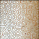 Galet en jade gravé de motifs nuageux Ming