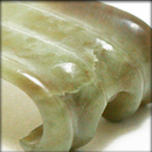 Ink rest or brush rest olive-green jade, possibly Ming