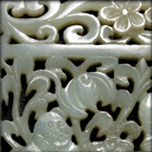 Plaque en jade céladon ajourée à décors de frères he he