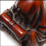A BOXWOOD NETSUKE BY HOSHUNSAI MASAYUKI, 19th Century